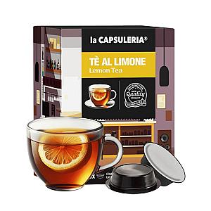 Saldi citrinų arbata Lavazza a modo mio pakelis ir arbatos puodelis